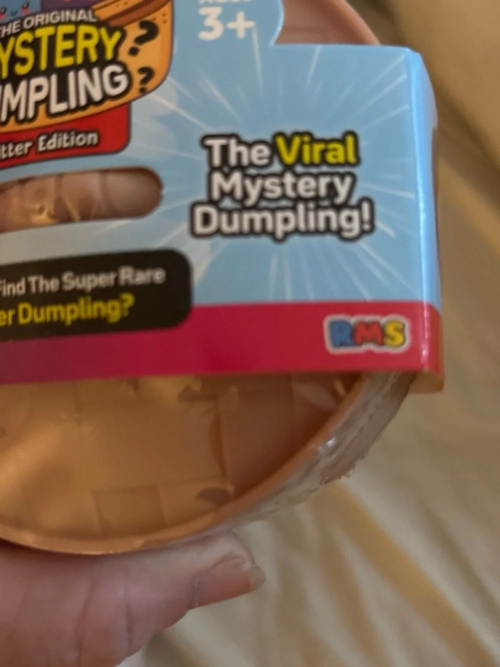 Mystery Dumpling Glitter Edition Surprise Toy - Blue/Yellow/Pink